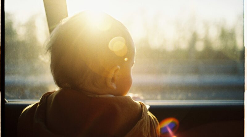 baby looking through car window